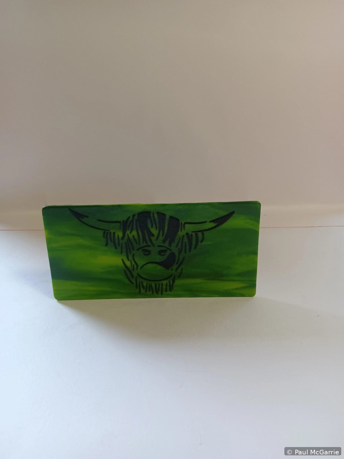 Highland Cow in Green, fused glass artwork by Paul McGarrie