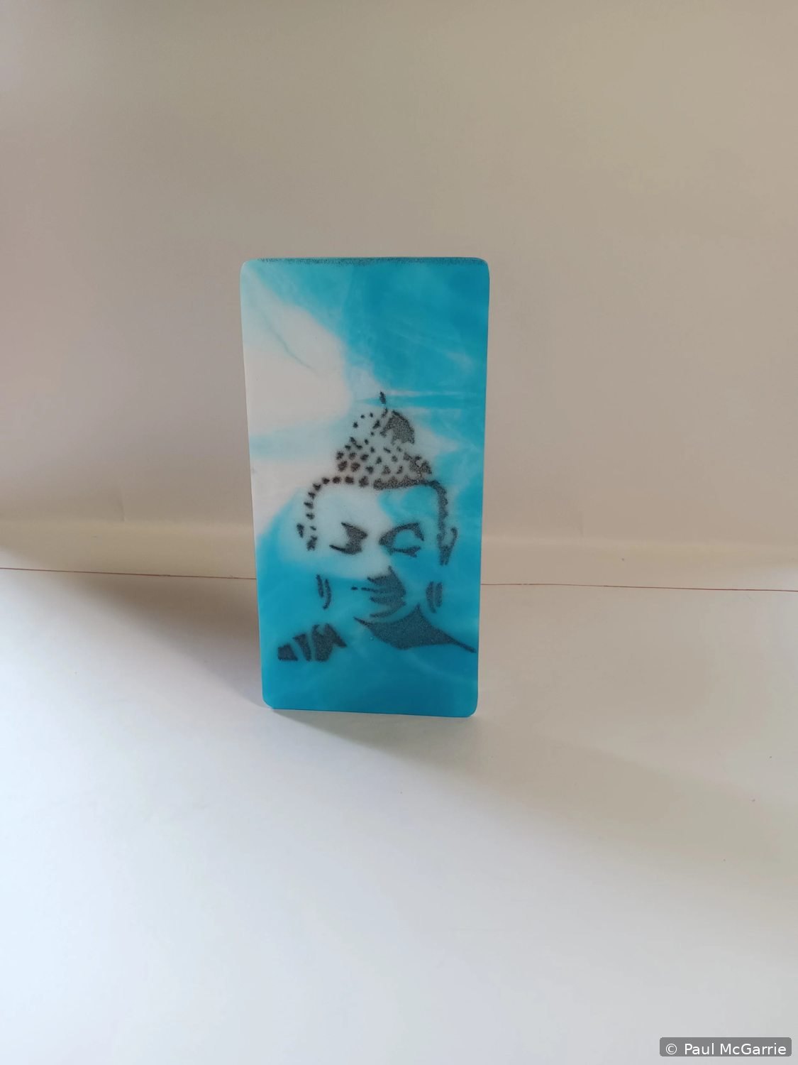 Buddha in Turquoise, fused glass artwork by Paul McGarrie, photograph 1
