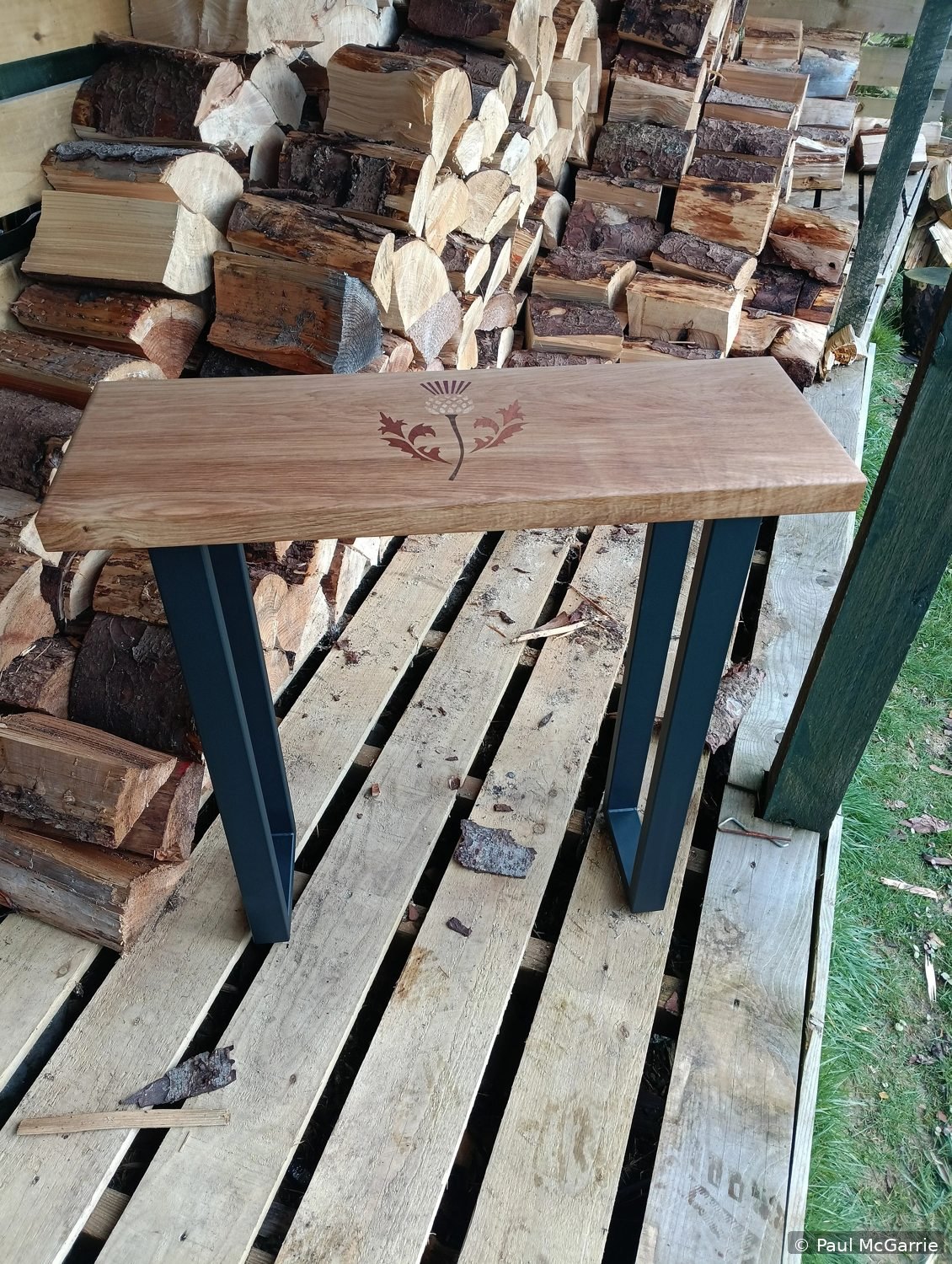 Handcrafted table with decorative glass and woodwork